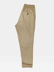 The Martin Elastic-waist Pleated Trouser in Khaki is a wardrobe staple.