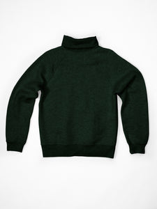 The Charles Turtleneck in Hunter Green is made of 100% cotton .